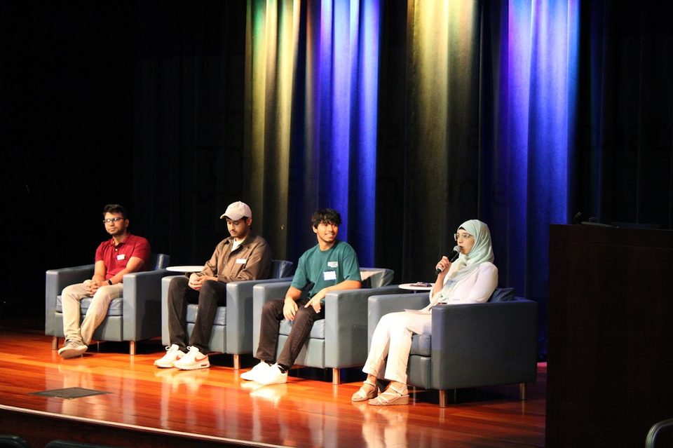 ISSS Global Leader panel at SJSU: Ambarish seated on the left in a red shirt